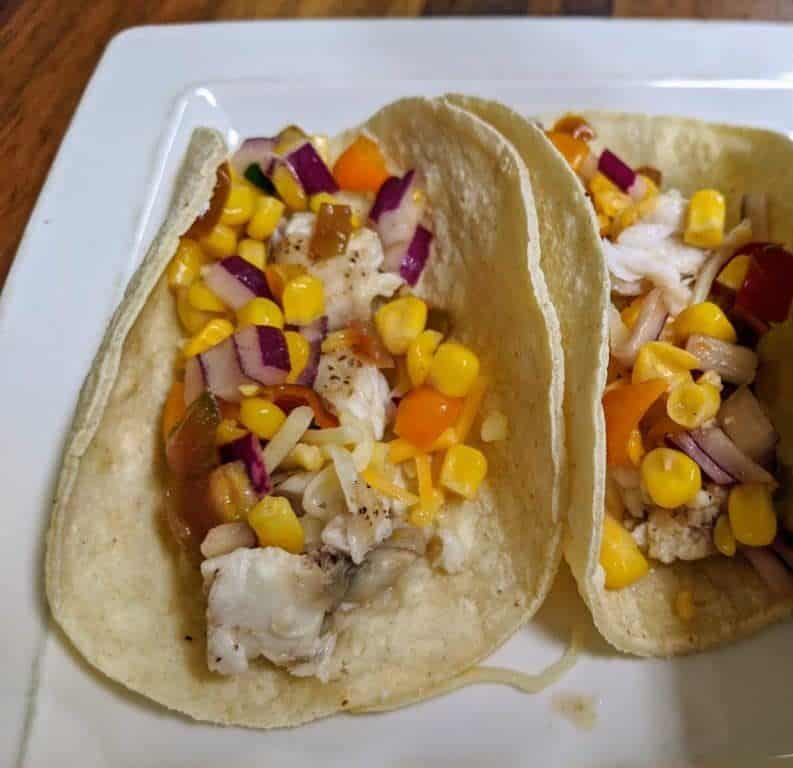 air fryer grouper tacos on a plate