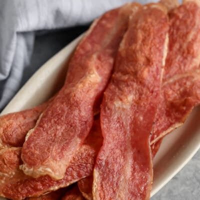 Strips of Air Fryer Turkey Bacon on a plate.