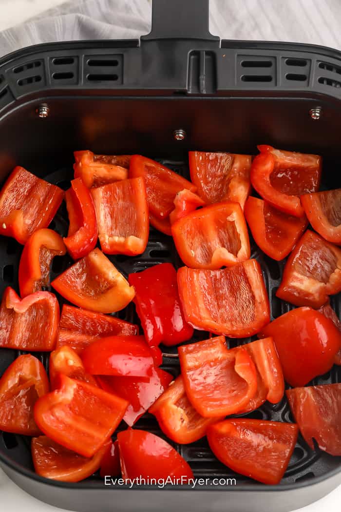 Red peppers in the air fryer basket