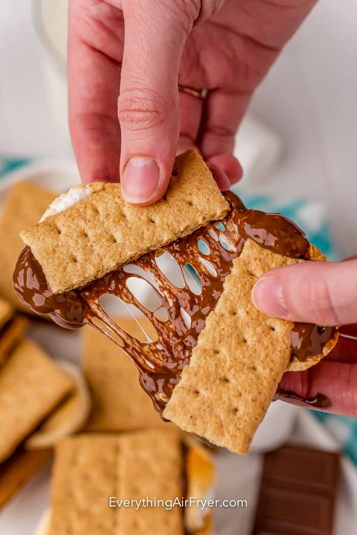 A gooey Air Fryer Smores being pulled apart.