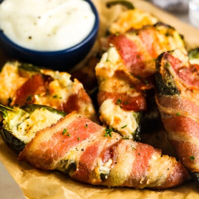 air fryer bacon wrapped jalapenos on a plate