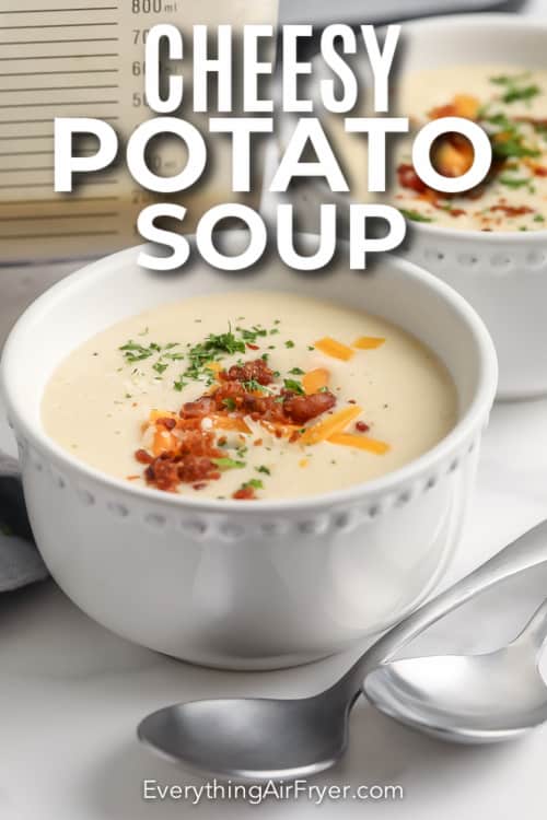 A prepared bowl of cheesy potato soup with text.