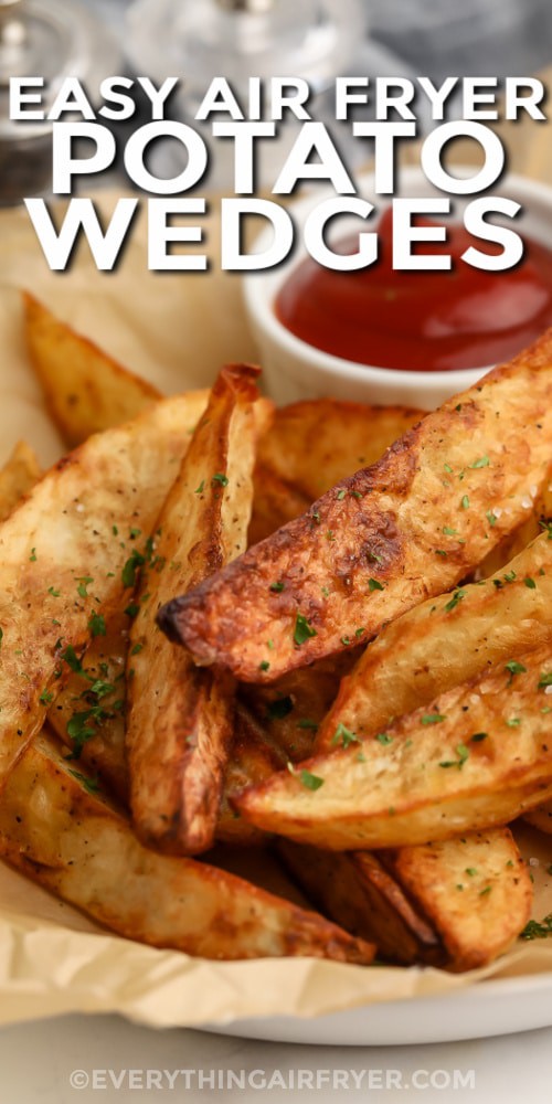 Air Fryer potato wedges plated with ketchup.