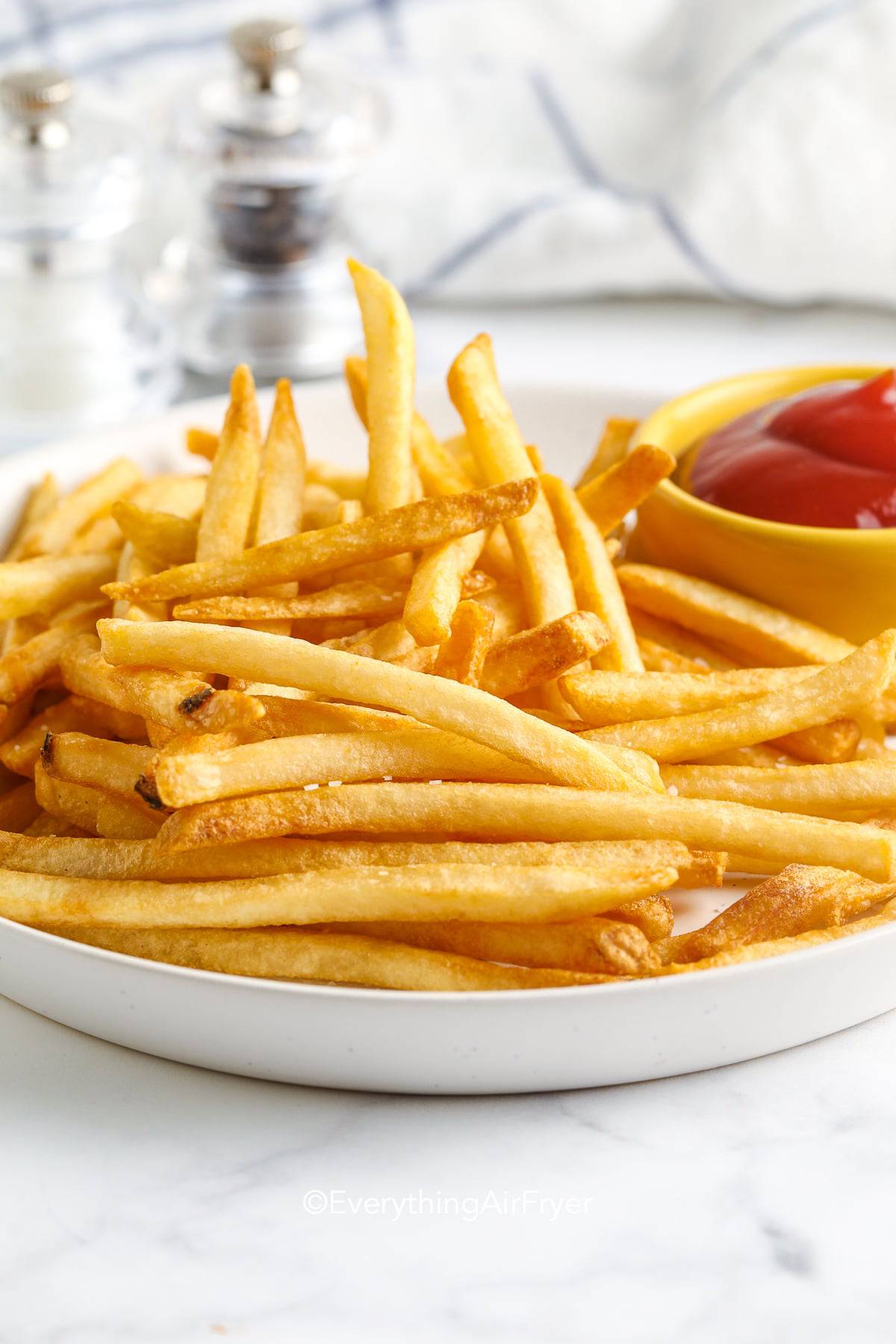 Air Fryer Frozen French Fries on a plate
