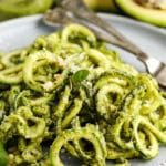 plated Avocado Pesto Zoodles with a fork