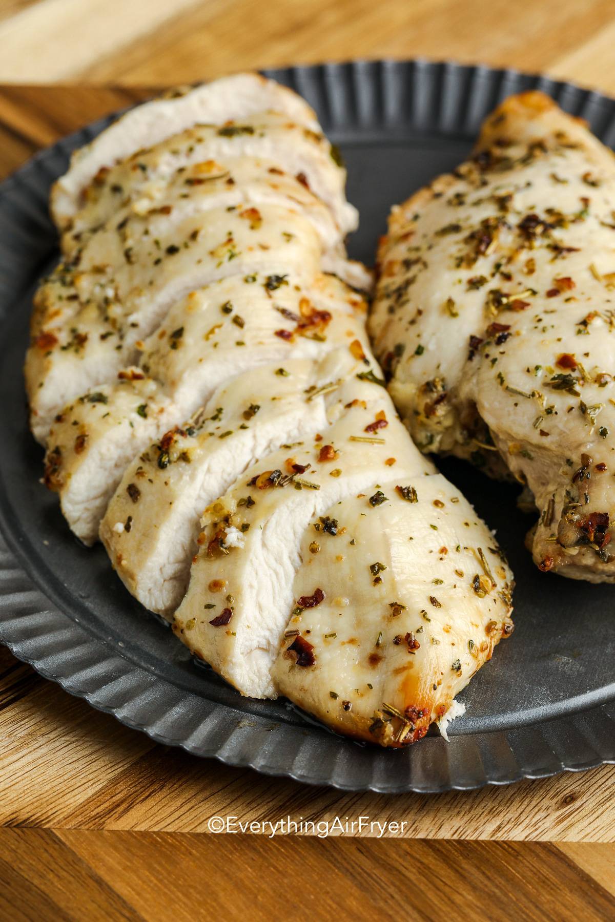 Air Fryer Herbed Chicken Breasts on a plate