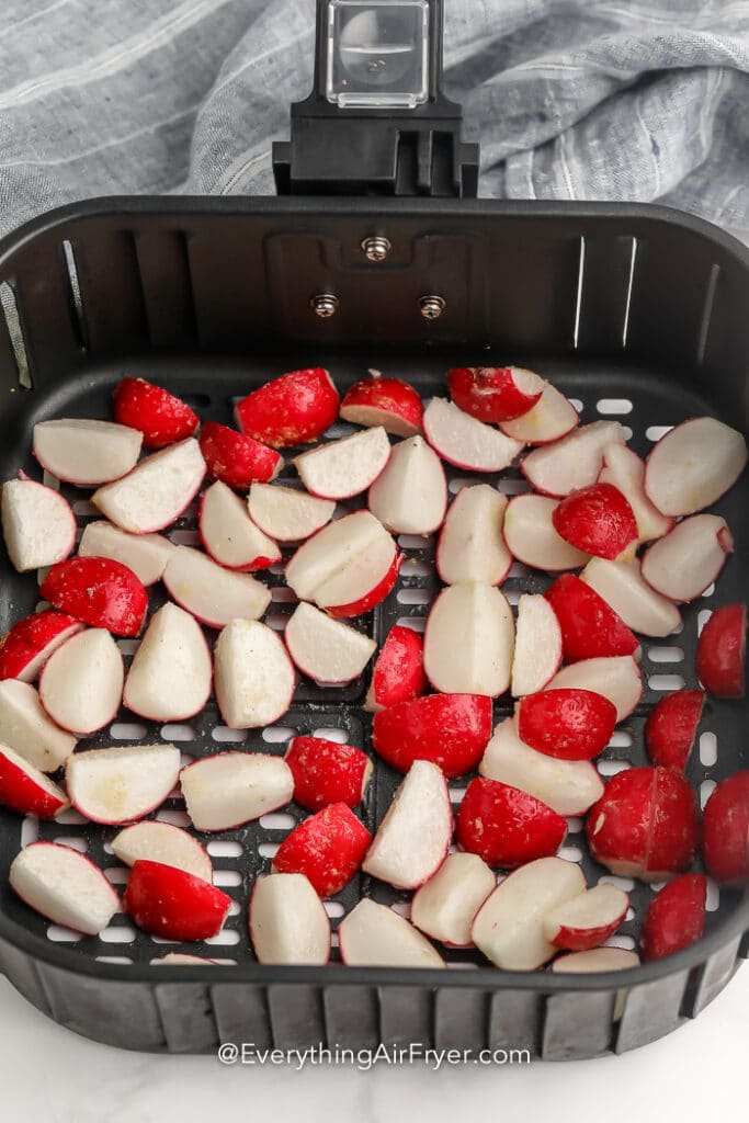 chopped radishes in an air fryer pan