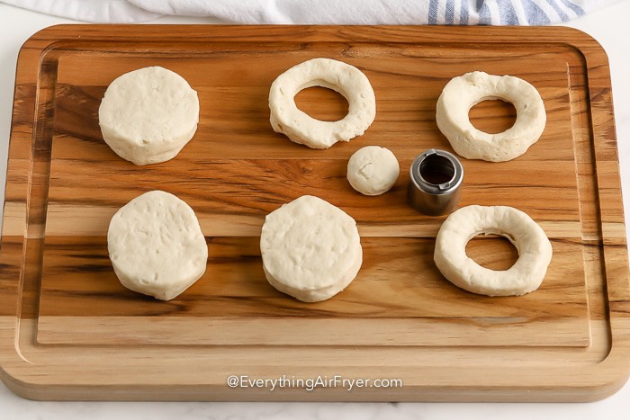 donut dough cut into rings