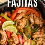 Air Fryer Chicken Fajita fillings cooked in an air fryer basket with text