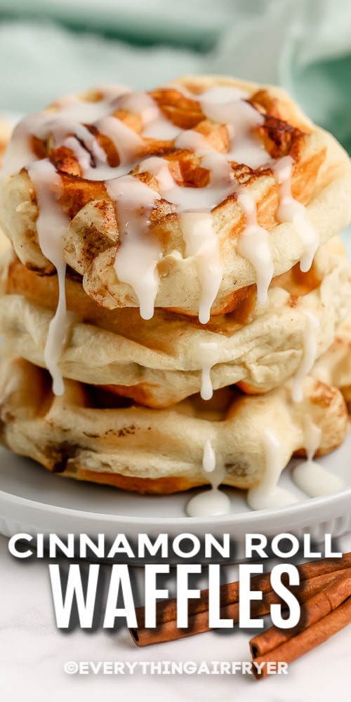 3 cinnamon roll waffles stacked with icing with text