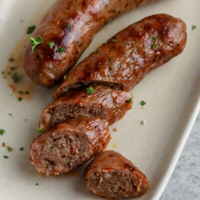 Air Fryer Italian Sausage sliced on a plate