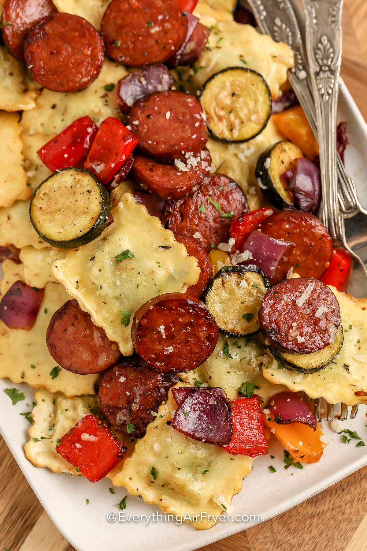 Air Fryer Mixed Vegetables with Ravioli and Sausage on a serving plate