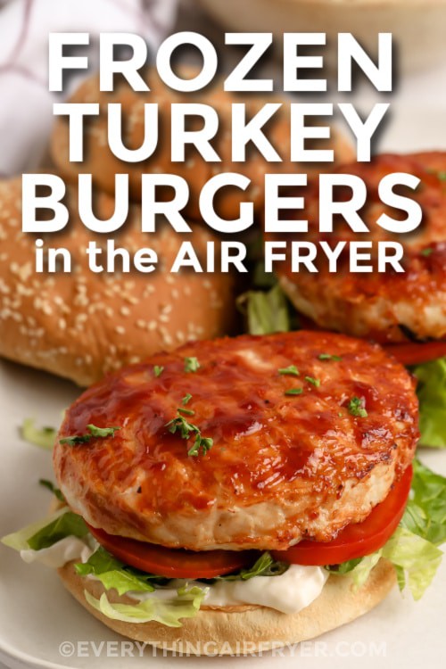 Air Fryer Turkey Burgers assembled on a plate with writing