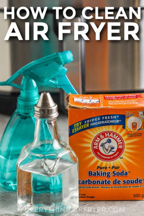 Baking soda, vinegar, and water for cleaning an air fryer with writing