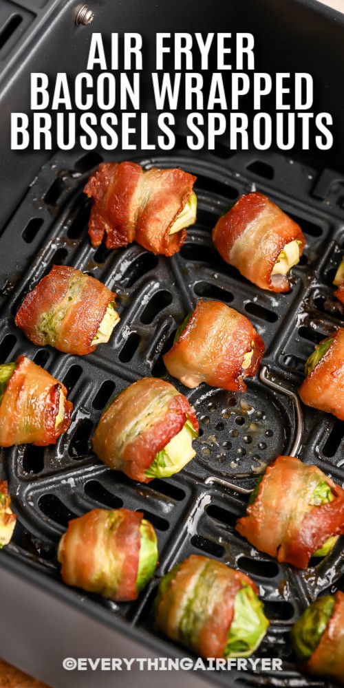 Bacon Wrapped Brussels Sprouts in an Air Fryer basket with writing