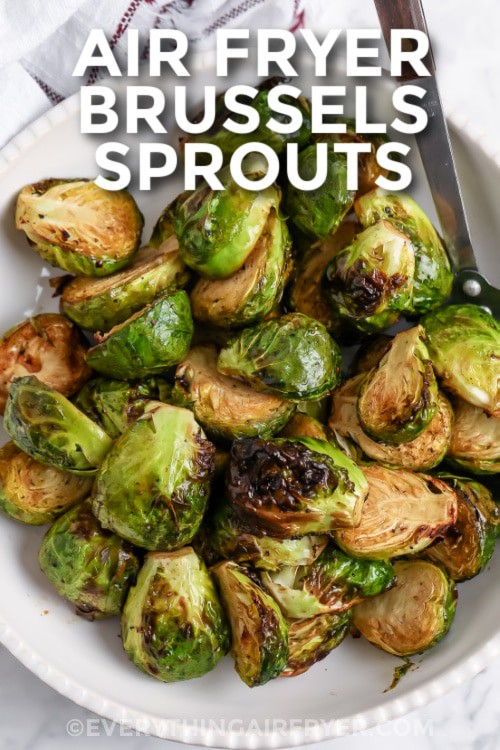 a serving dish of Air Fryer Brussels Sprouts with writing