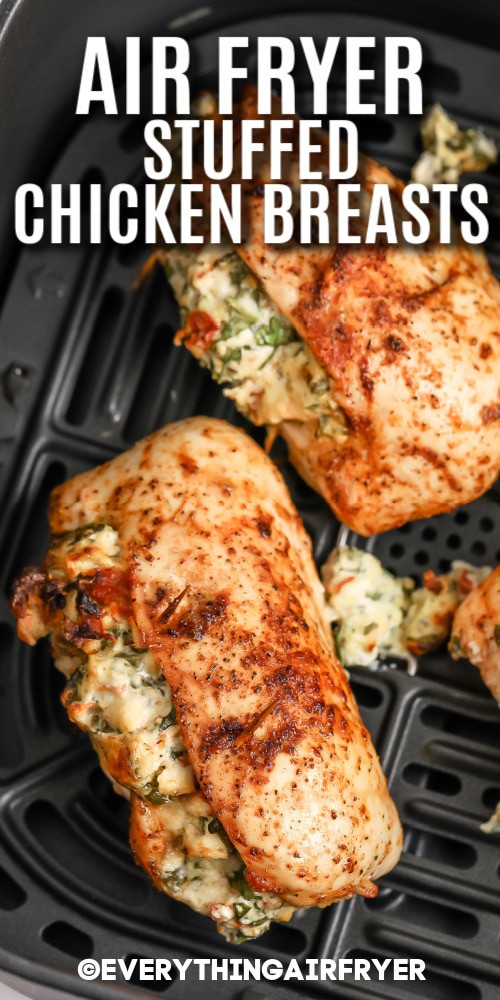 Stuffed Chicken Breasts in an air fryer basket with writing