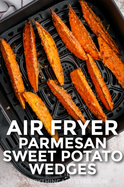 Air fryer sweet potato wedges in an air fryer basket with a title