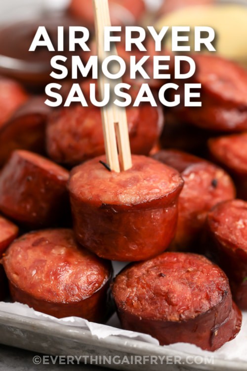 Air Fryer smoked sausage with a serving pick on it with a title