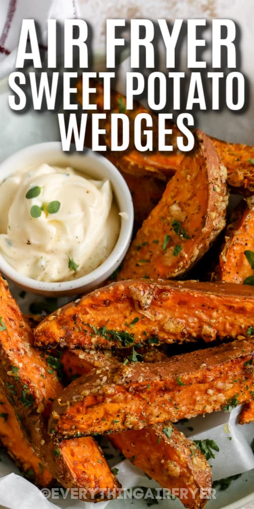 A bowl of air fryer parmesan sweet potato wedges with a title