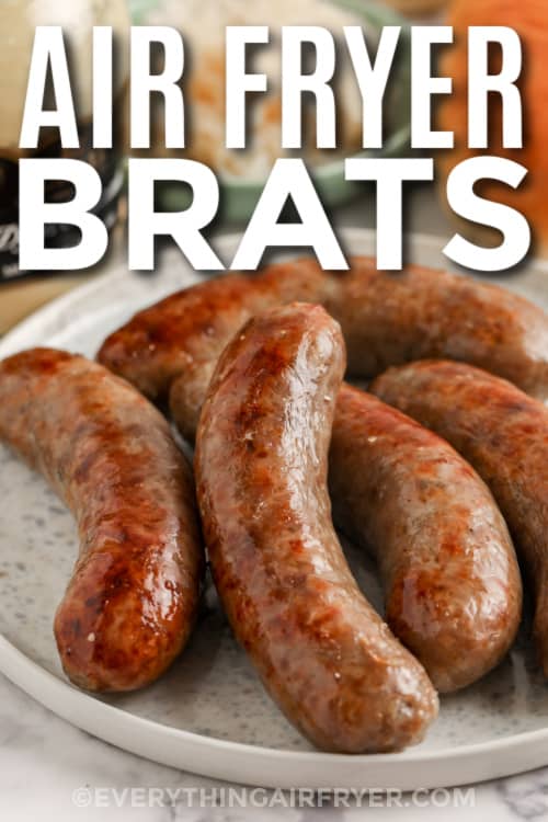 cooked sausages on a plate with text