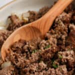 cooked ground beef with text