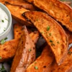 sweet potato wedges on a plate with text