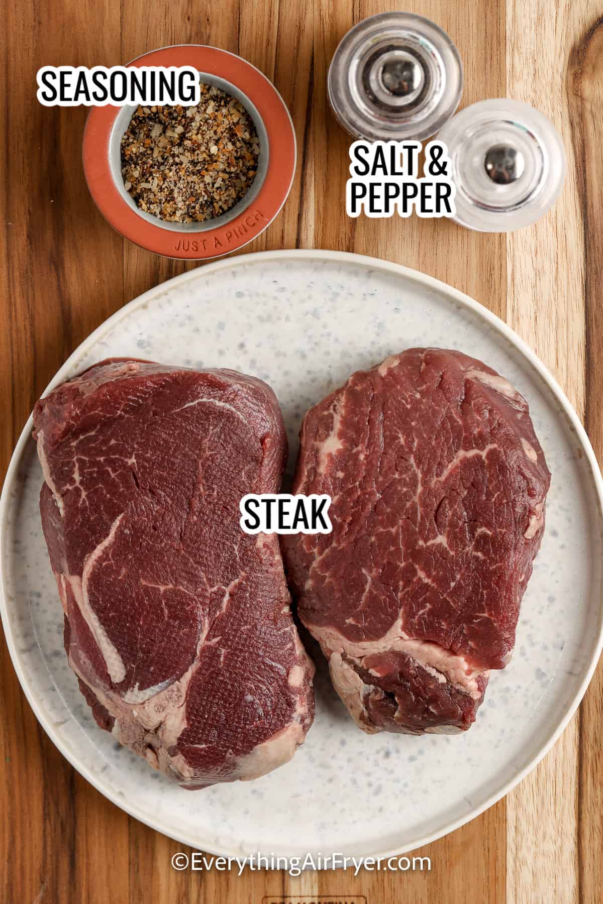 ingredients to make air fryer steak with labels including steak and seasonings