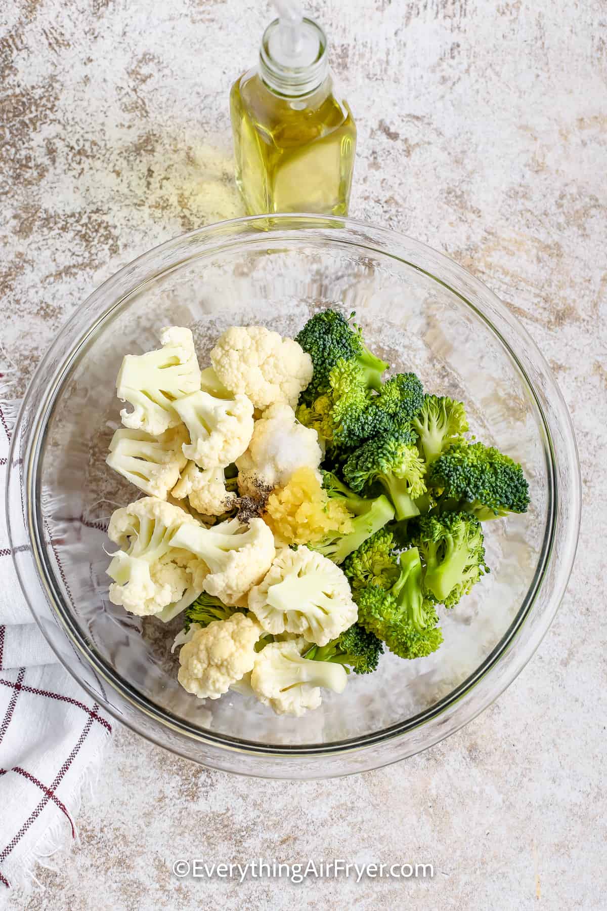 Air Fryer Broccoli and Cauliflower ingredients in a bowl