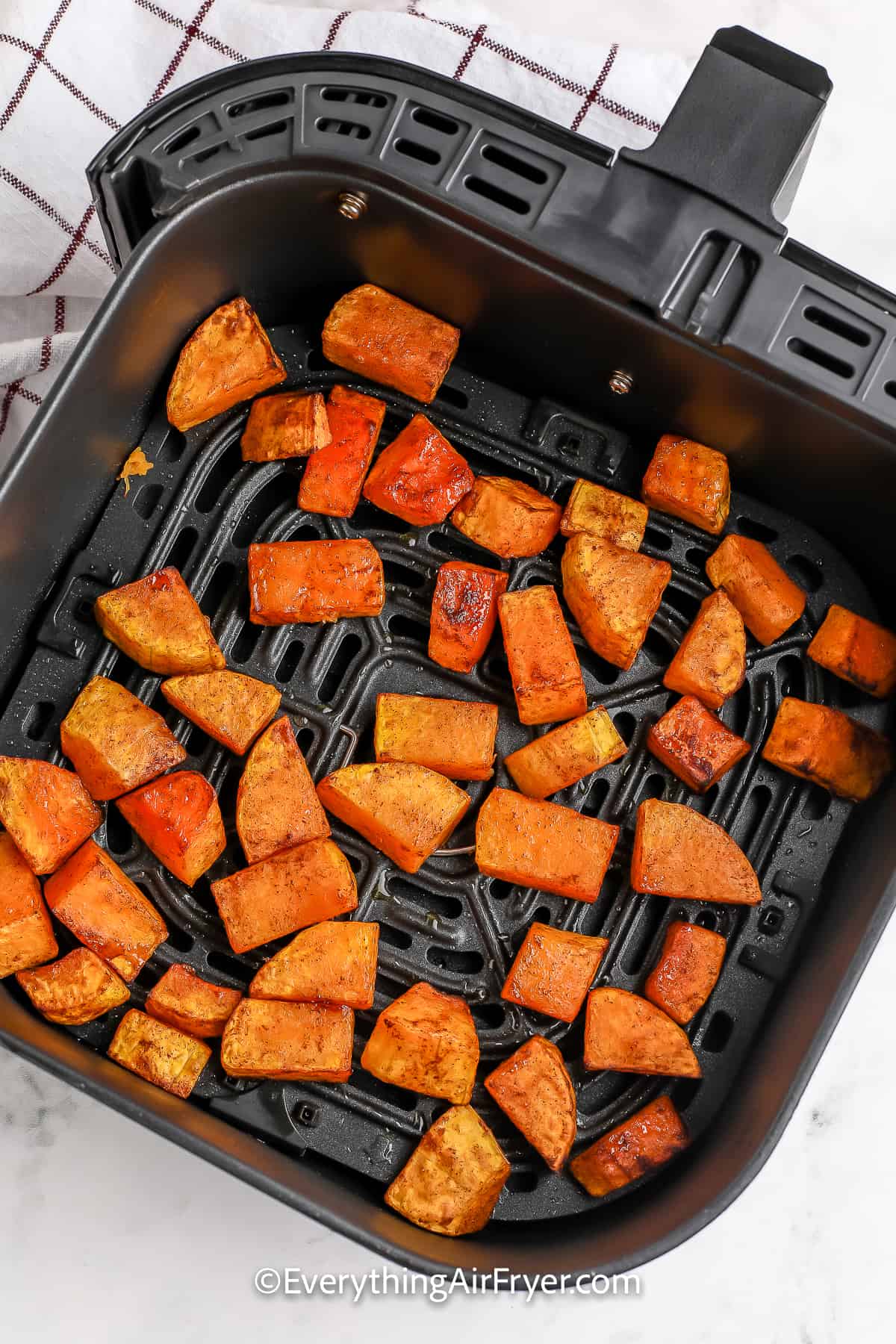 Butternut Squash cooked in an air fryer basket