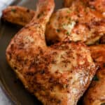Cooked Air Fryer Chicken Legs on a plate