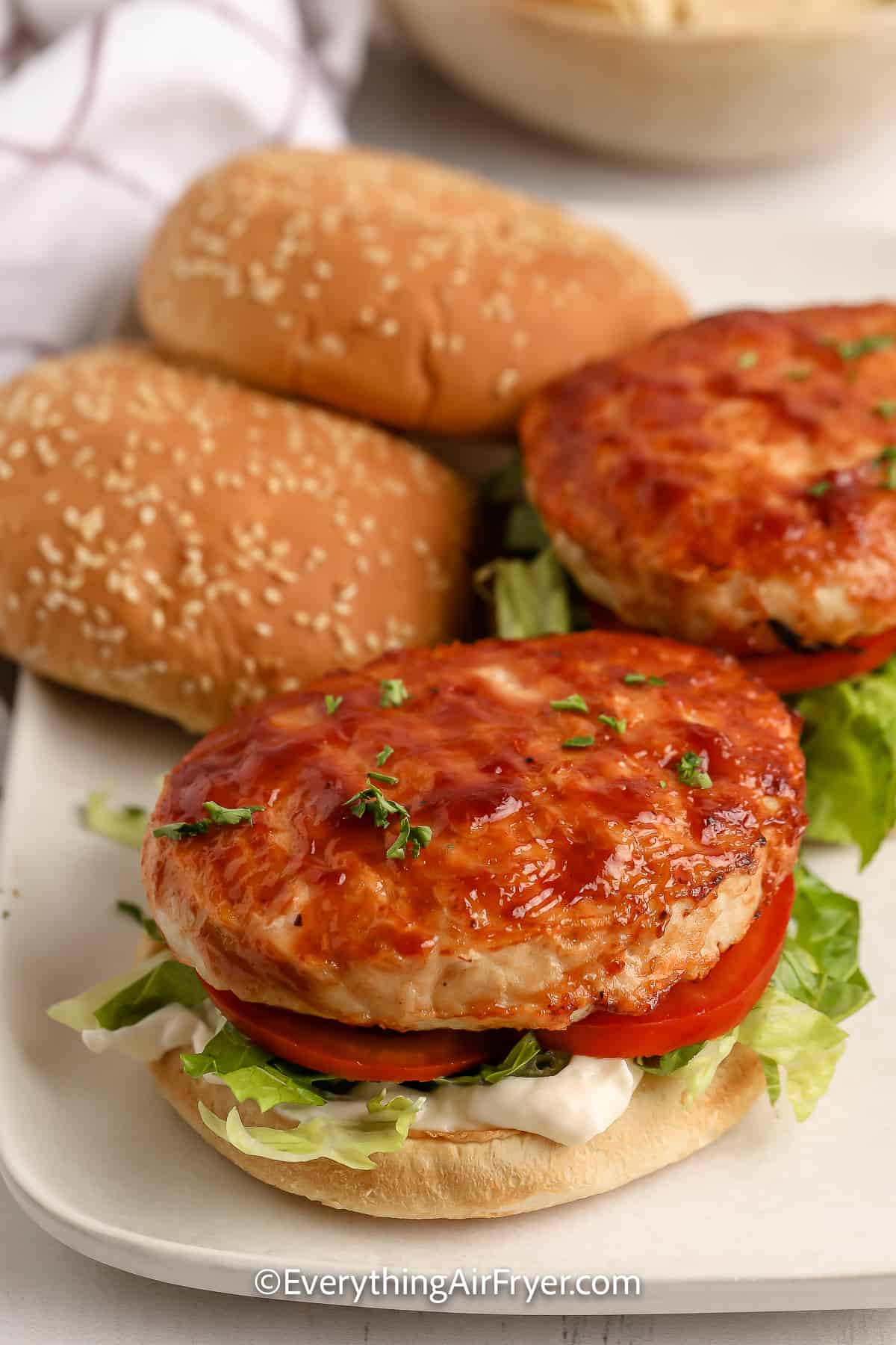 Air Fryer Turkey Burger partially assembled on a plate