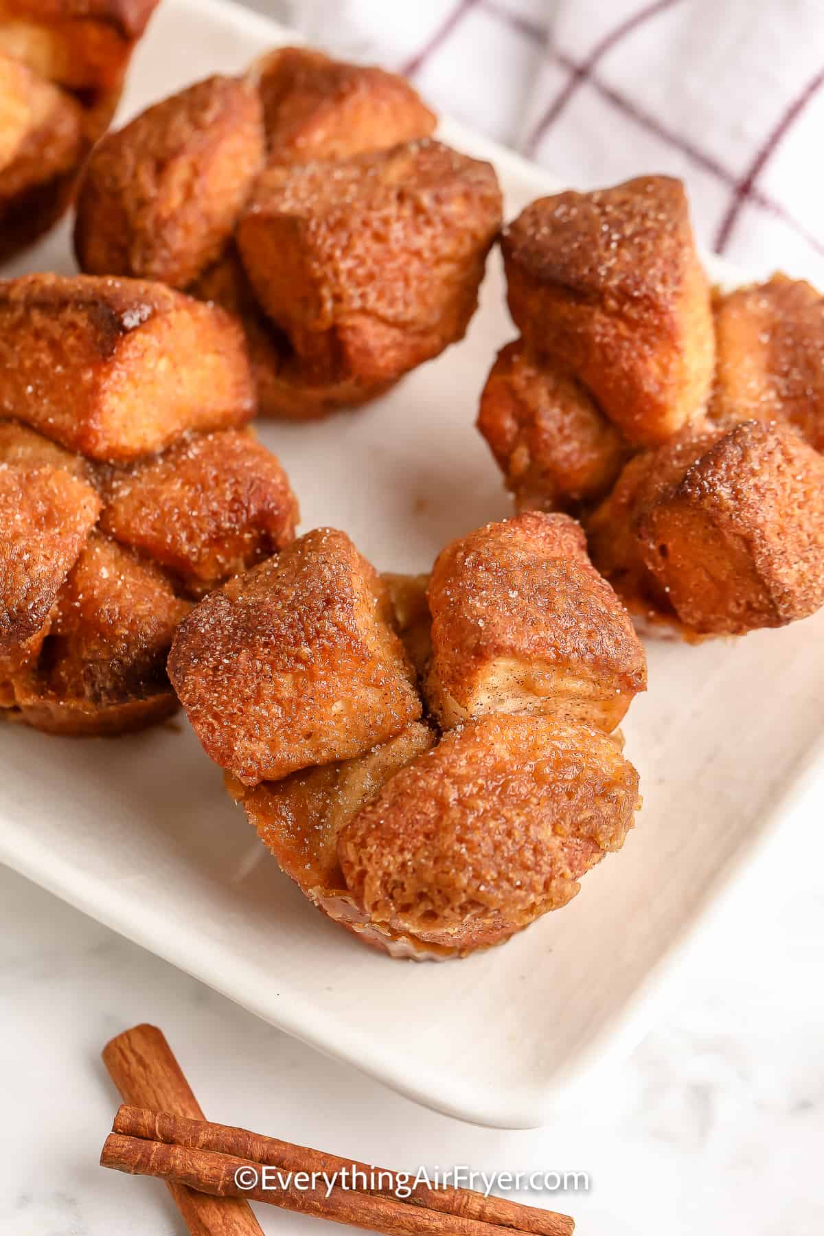 Air Fryer Monkey Bread Minis prepped on a plate