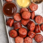 Air Fryer Smoked Sausage on a platter with dips