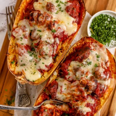 Two Air Fryer Stuffed Spaghetti Squash halves being served