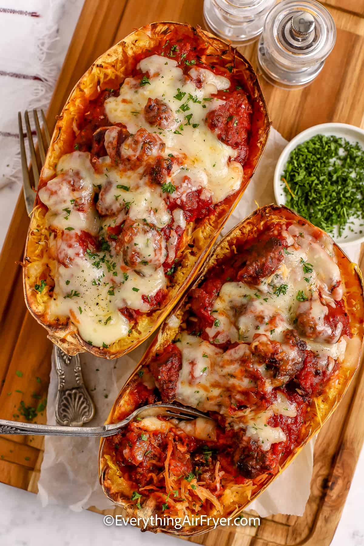 Two Air Fryer Stuffed Spaghetti Squash halves being served