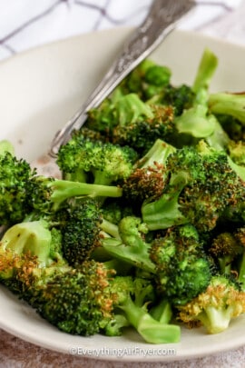 A serving dish with air fryer broccoli