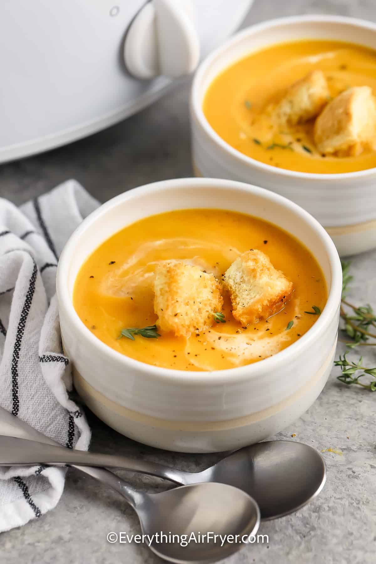 Two bowls of Crockpot Butternut Squash Soup