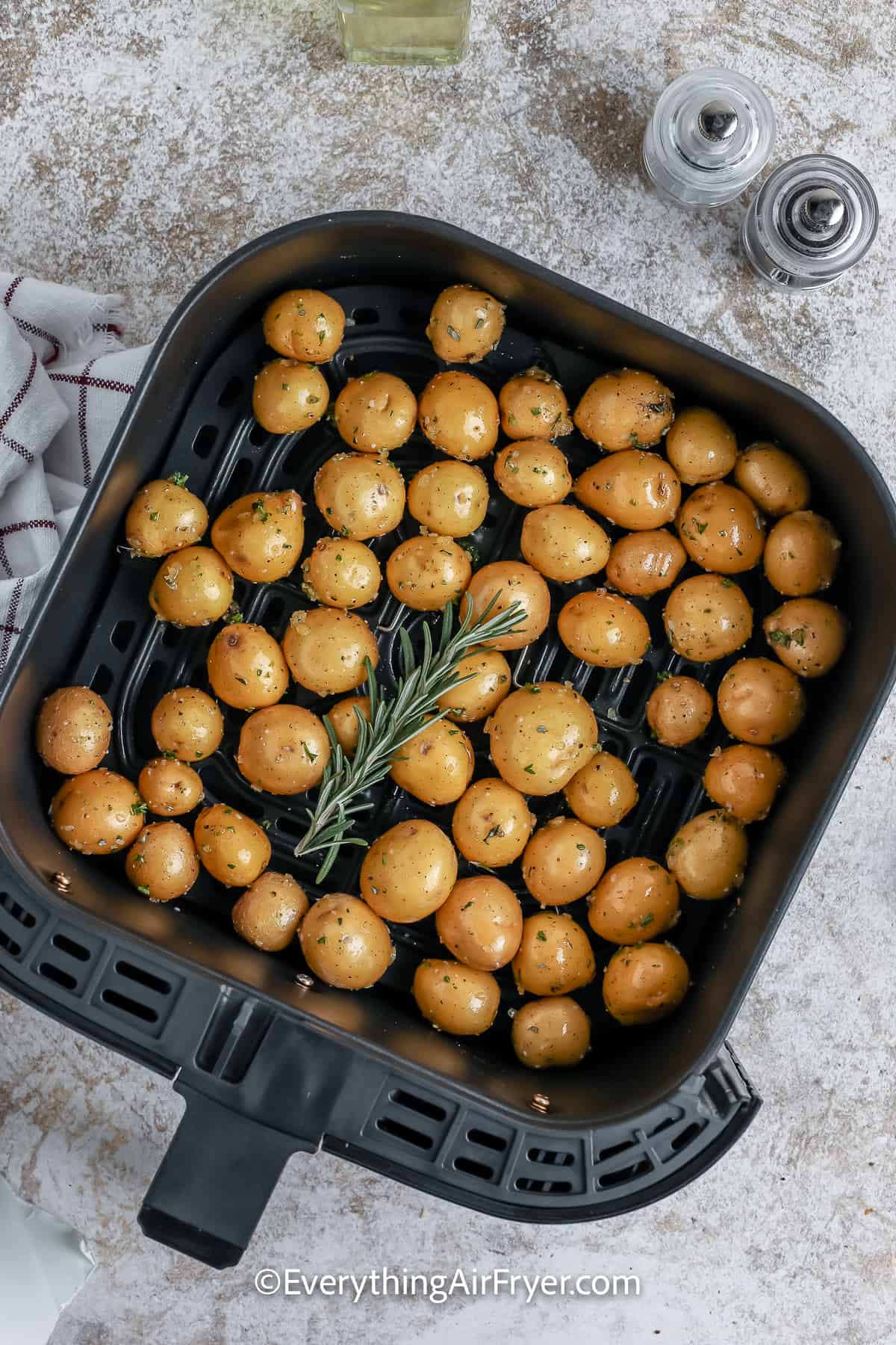 baby potatoes in an air air fryer tray