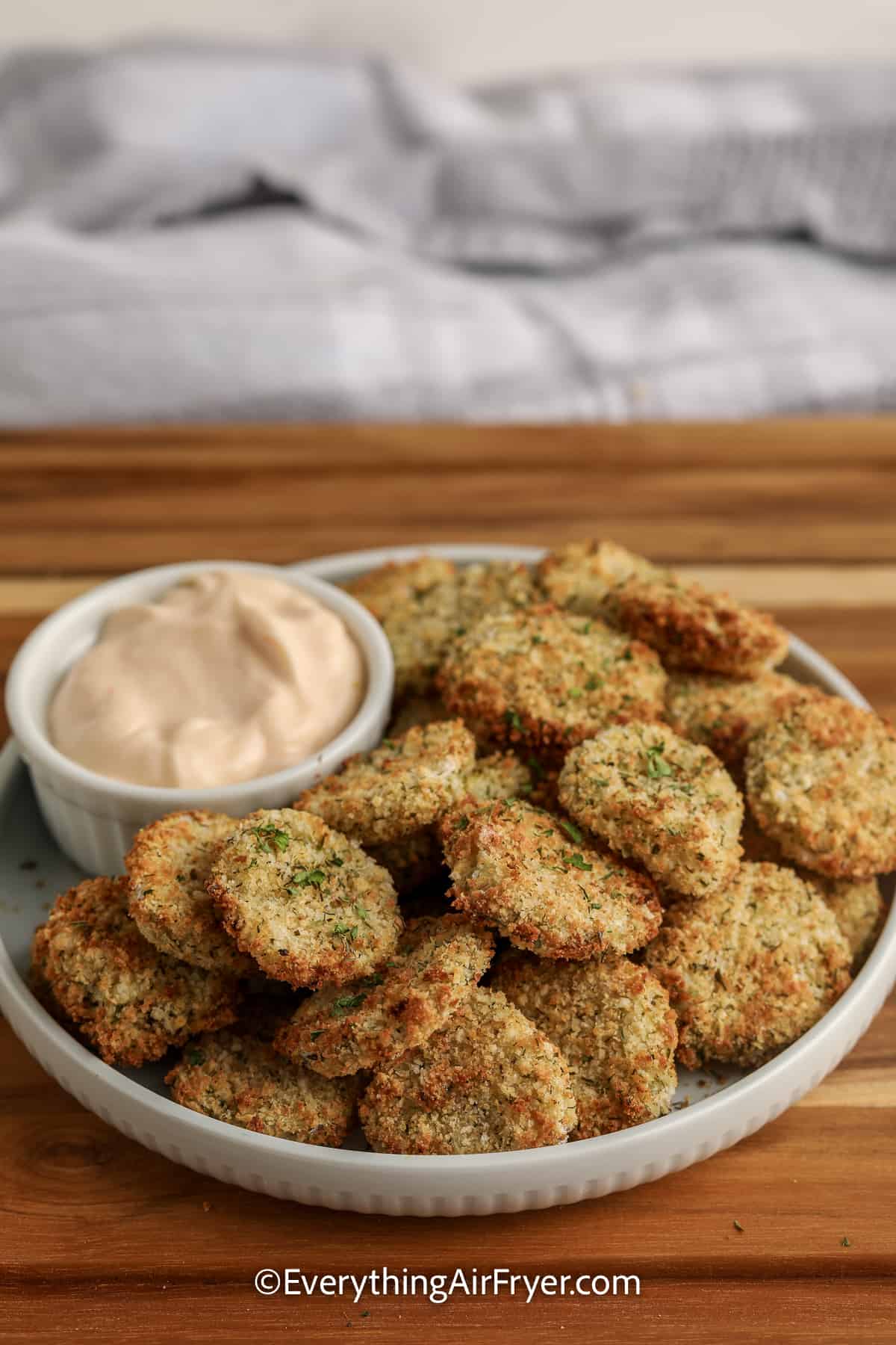air fryer dill pickle chips on a plate