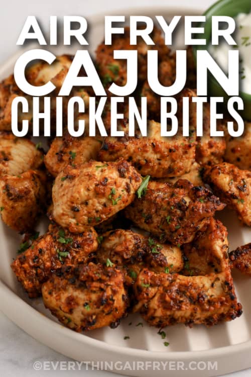 cajun chicken bites on a plate with text
