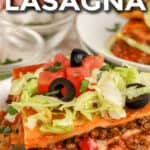 slice of Mexican lasagna on a plate with text