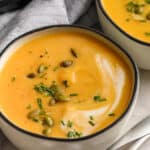 instant pot butternut squash soup in bowls with text