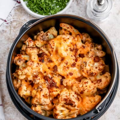 air fryer bacon cauliflower mac and cheese in a cooking dish