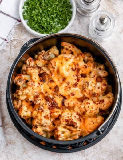 air fryer bacon cauliflower mac and cheese in a cooking dish