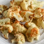 A plate of cheesy air fryer cauliflower