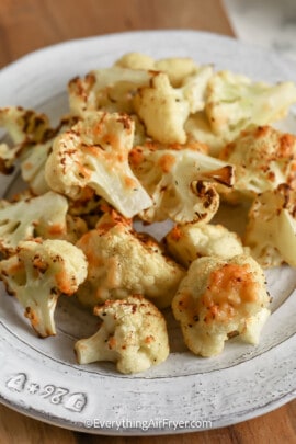 A plate of cheesy air fryer cauliflower