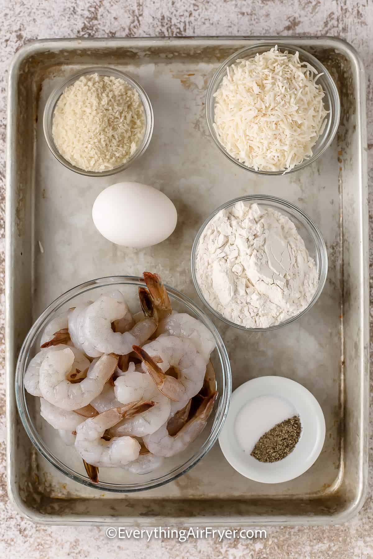 Air Fryer Coconut Shrimp Ingredients on a baking tray