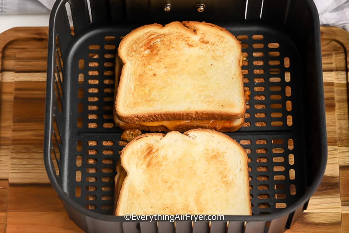 Air Fryer Grilled Ham and Cheese in an air fryer basket