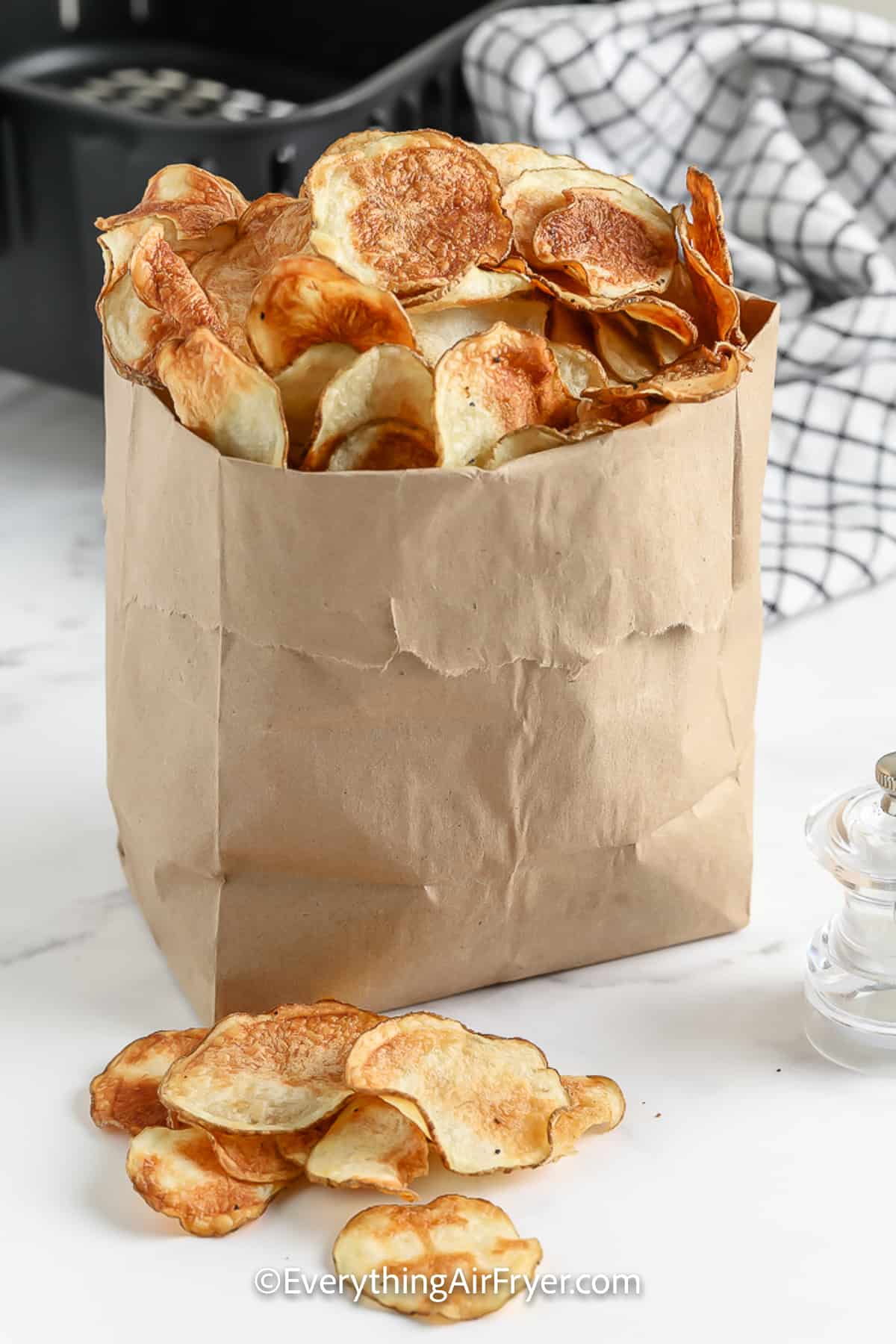 A paper bag full of Air Fryer Potato Chips